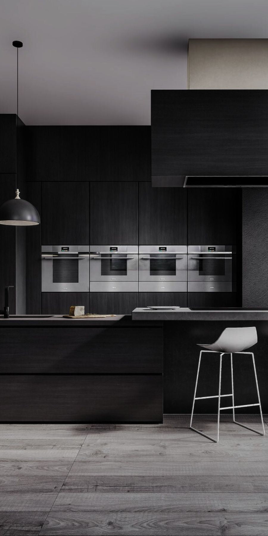 Modern kitchen featuring built-in ovens, integrated fridge & freezer, dishwasher, induction cooktop and a rangehood.