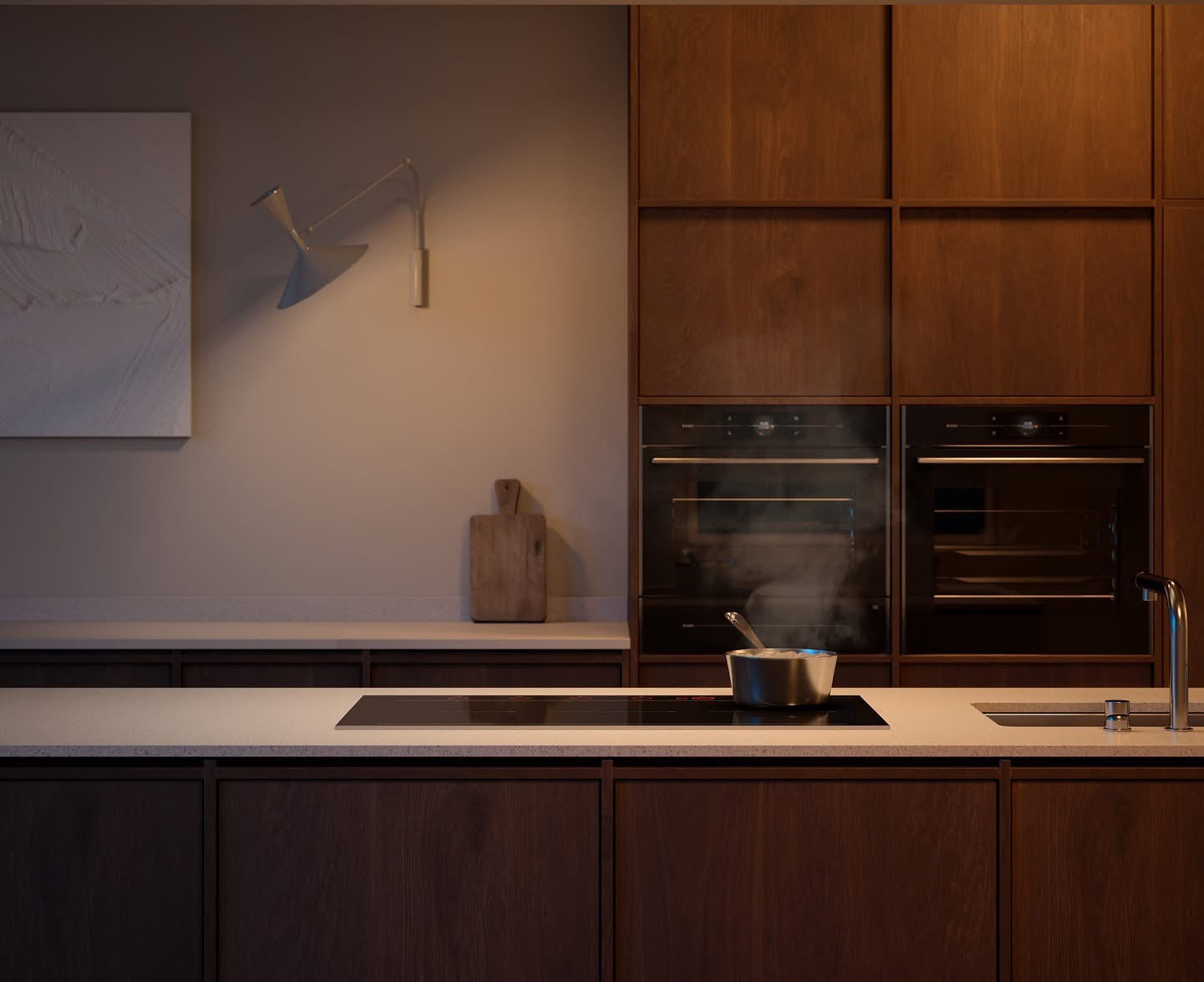 Kitchen with built-in ovens and a induction cooktop.