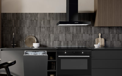 Modern kitchen with smeg oven, dishwasher, rangehood and induction cooktop.